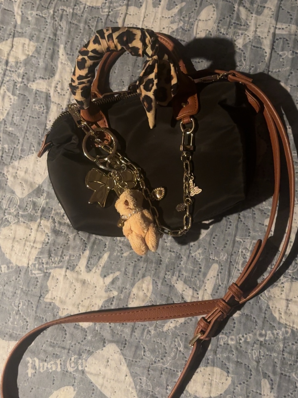 Madden Girl Black Crossbody Bag with Brown Trim and Gold Charm